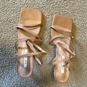 The Glow Nude strapped sandals
